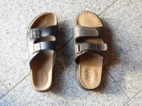 an odd pair of sandals